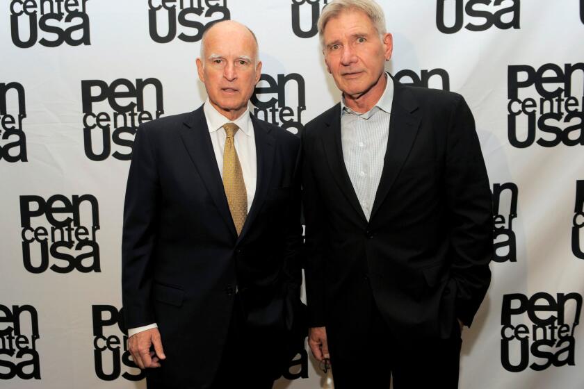 California Gov. Jerry Brown, left, and actor Harrison Ford honored Joan Didion at the PEN Awards -- but Didion was not able to attend.