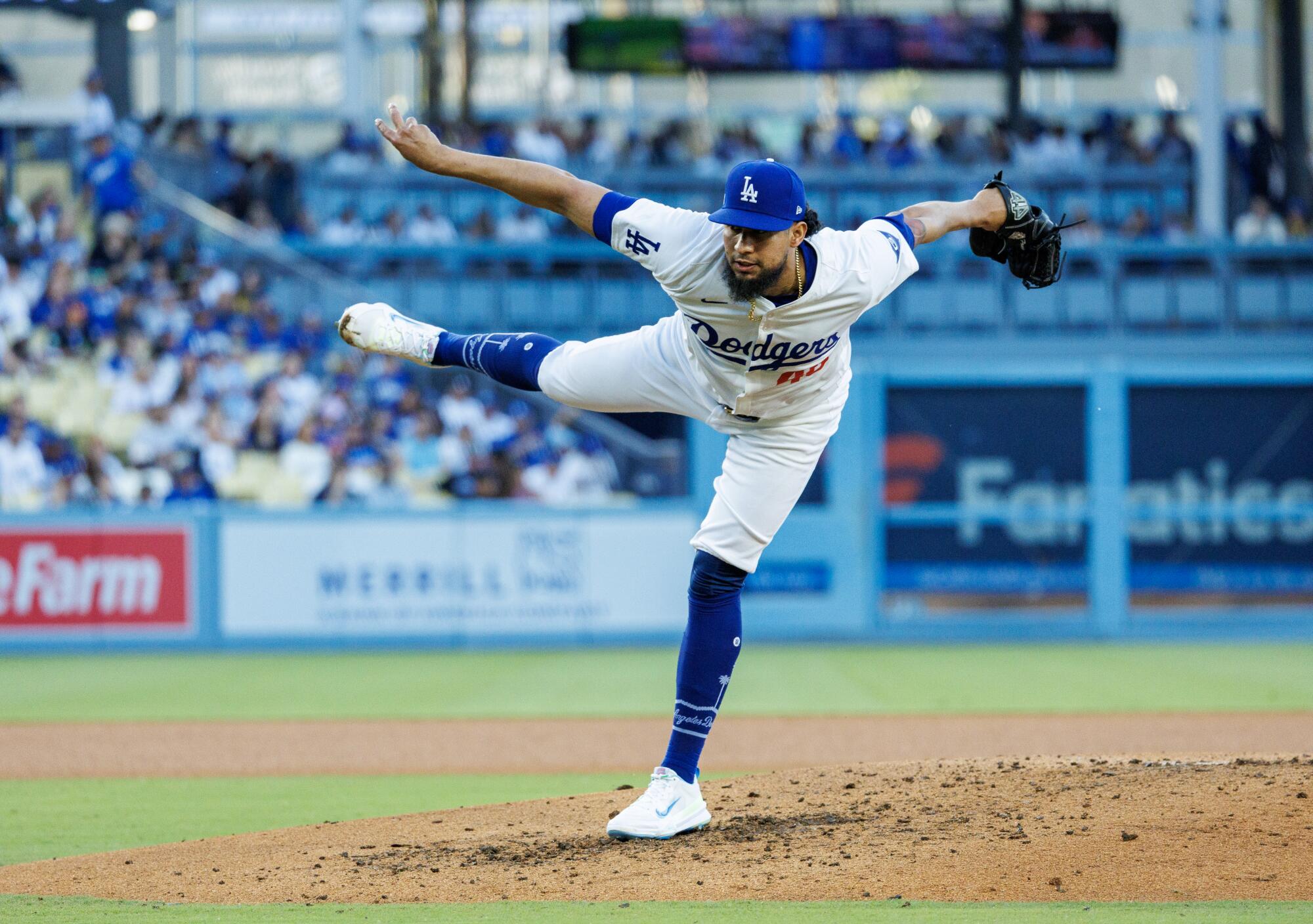 Dodgers pitcher Yohan Ramírez pitches in relief in the fifth inning against the Royals at Dodger Stadium on June 15.