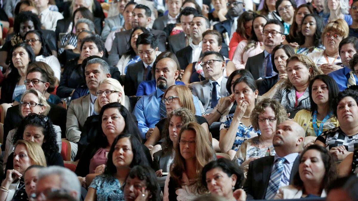 LAUSD staff listen to Supt. Michelle King's speech.