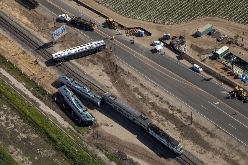 Aerial view of the Metrolink train derailment in Oxnard. The crash occurred at the Rice Avenue crossing, causing three cars to derail and injuring at least 28 people.