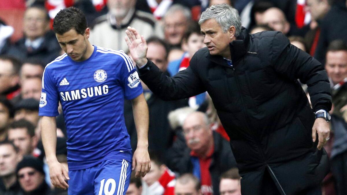 Jose Mourinho has a few words for midfielder Eden Hazard during an English Premier League game against Arsenal in April.