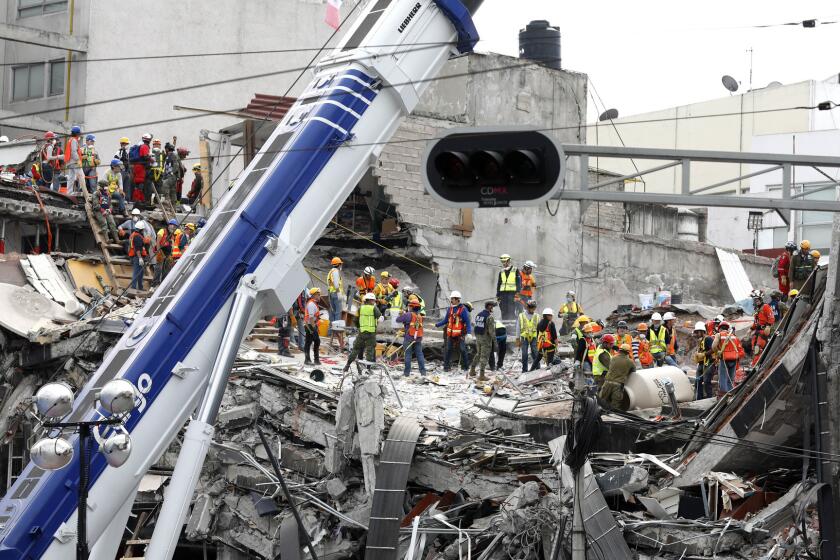 The search continues for victims buried under the rubble of a fallen office building along Calle Alvaro Obregon in La Condesa neighborhood of Mexico City.