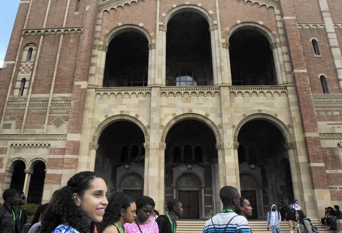 A group of prospective students tours the UCLA campus. UCLA received a record 112,000 freshman and transfer applications for the fall, the most of any other four-year university in the nation, campus officials said.