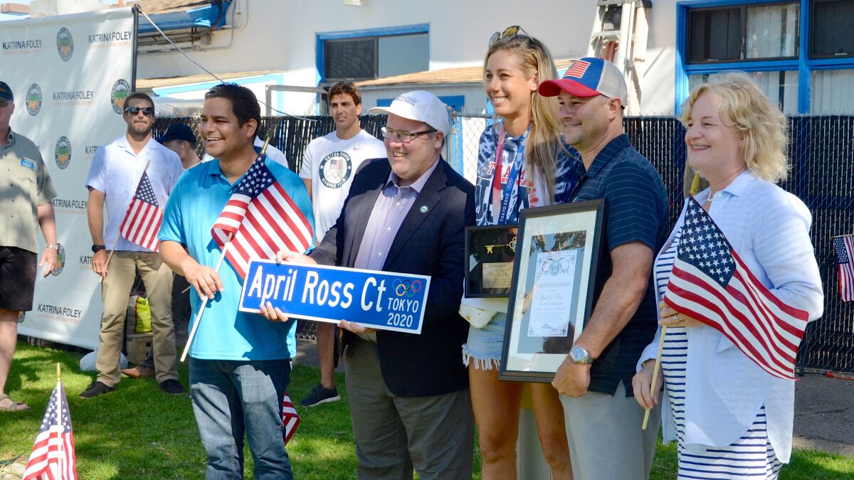 Costa Mesa Mayor John Stephens presented Olympic volley ball player April Ross with the key to the city Sunday.