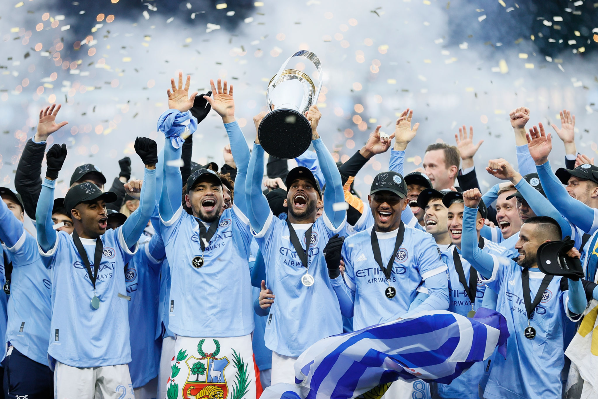 New York City FC players celebrate after defeating the Portland Timbers to win the MLS Cup on Saturday.