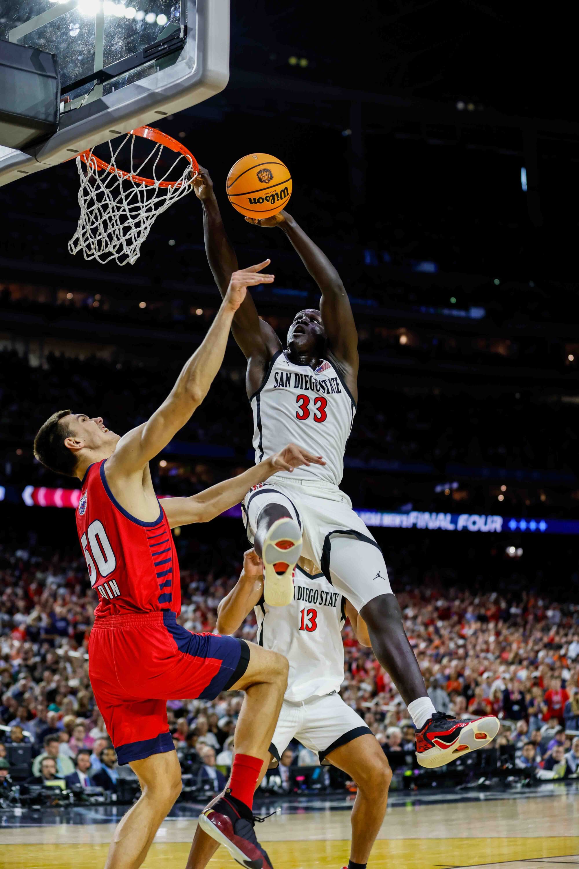 San Diego State forward Aguek Arop puts up a shot.