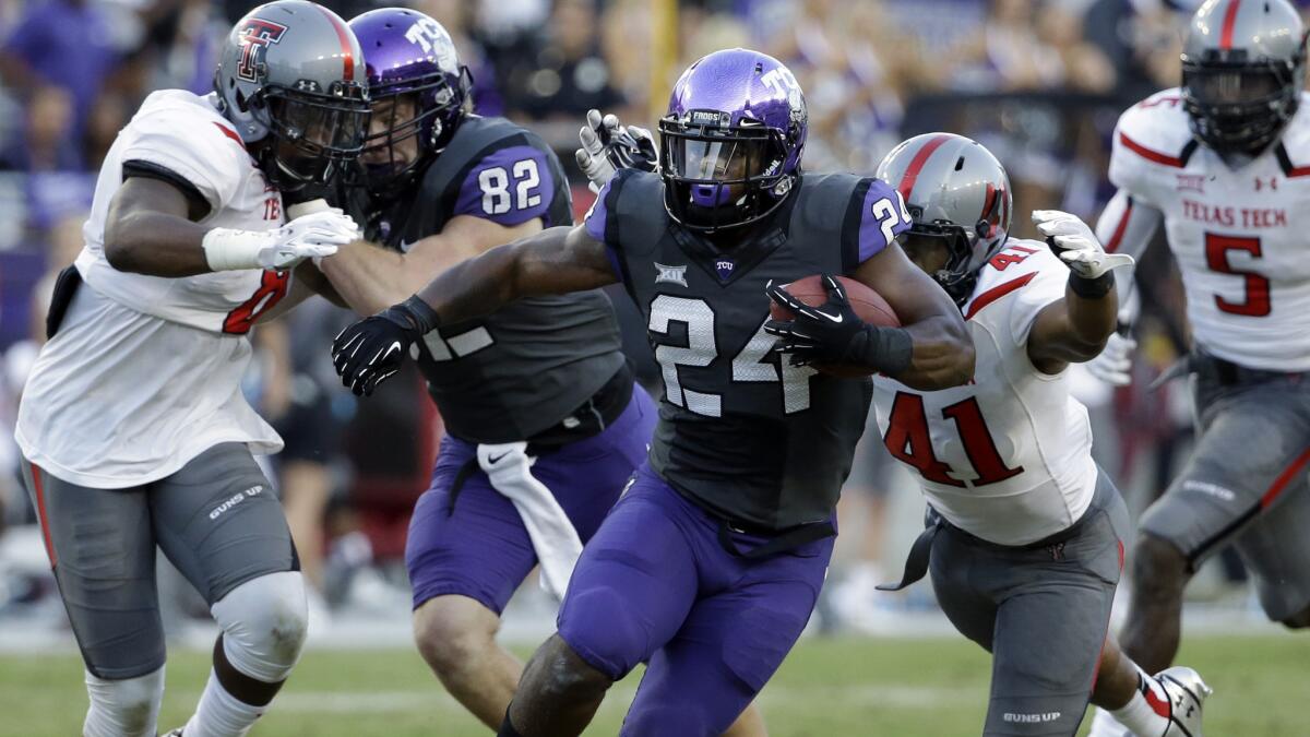 TCU running back Trevorris Johnson carries the ball during the Horned Frogs' blowout victory over Texas Tech on Saturday.