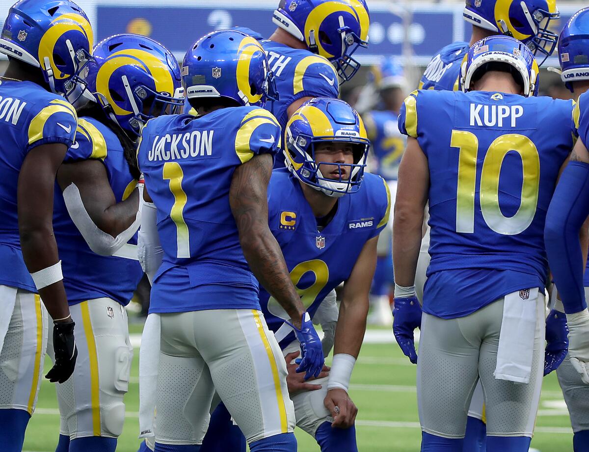 Rams quarterback Matthew Stafford huddles with his teammates during a win over the Detroit Lions on Oct. 24.