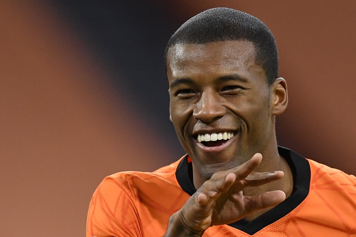 Netherlands' Georginio Wijnaldum celebrates scoring his side's first goal during the UEFA Nations League soccer match between The Netherlands and Bosnia and Herzegovina at the Johan Cruyff ArenA in Amsterdam, Netherlands, Sunday, Nov. 15, 2020. (John Thys/Pool via AP)