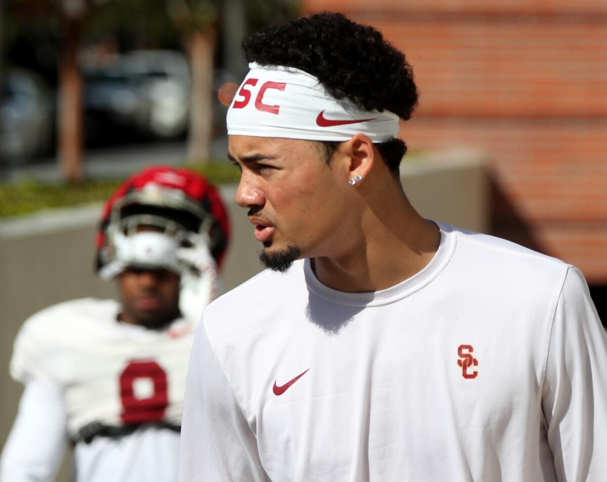 USC quarterback Malachi Nelson stands on the field during practice.