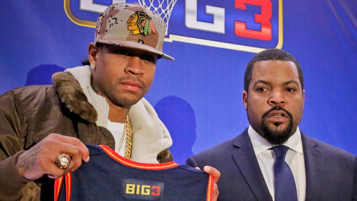 Allen Iverson, left, and Ice Cube announce the launch of the BIG3 professional basketball league Wednesday in New York.