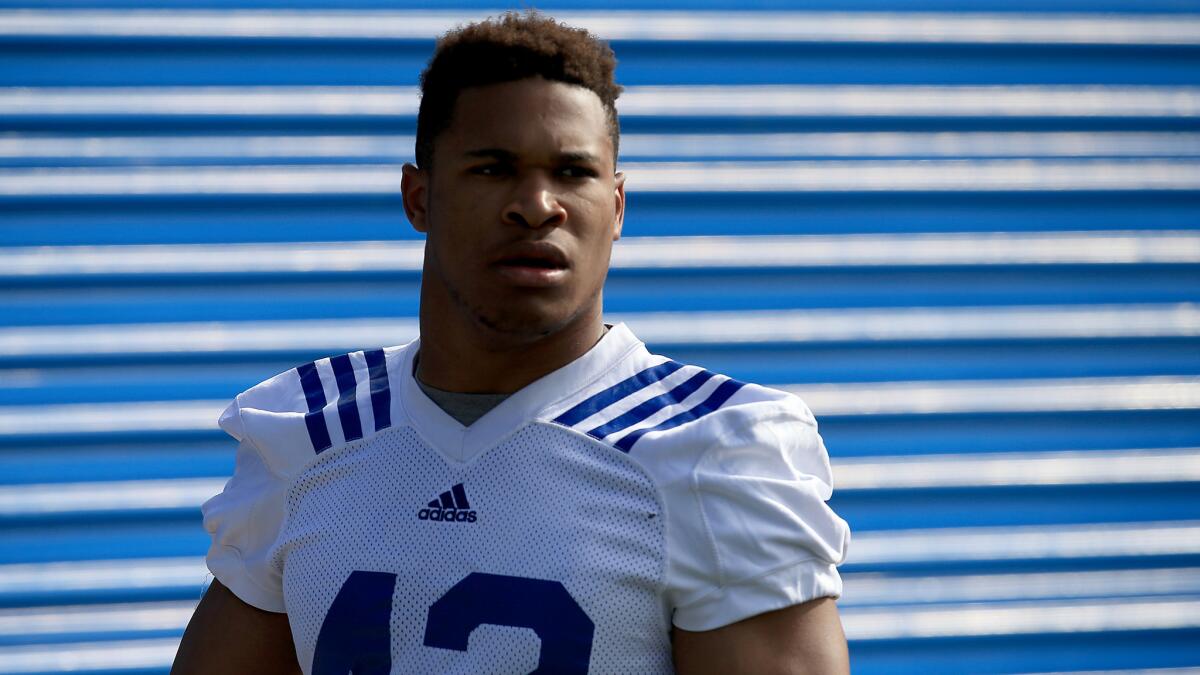 UCLA linebacker Kenny Young looks on during spring practice in 2015.