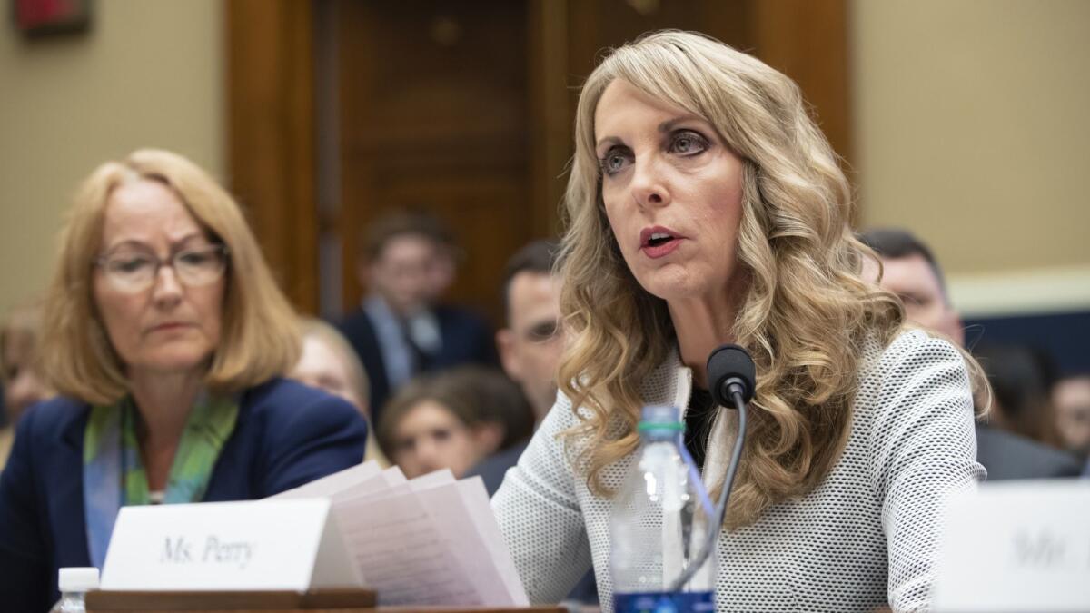 USA Gymnastics head Kerry Perry, right, and U.S. Olympic Committee acting chief executive Susanne Lyons testified before a subcommittee of the House Energy and Commerce Committee on Wednesday.