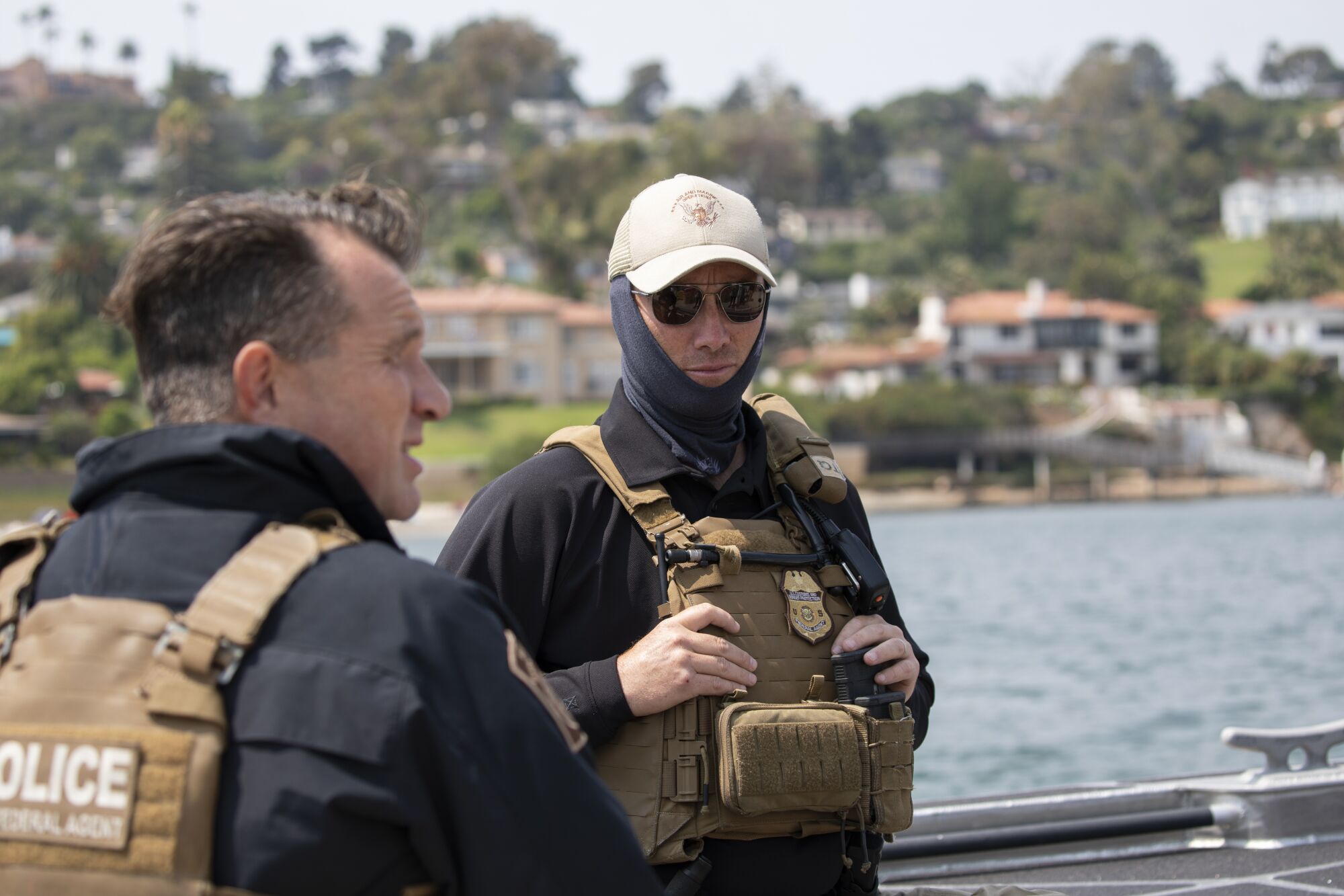 Marine interdiction agents Evan Wagley and J.J. Posey on a boat.