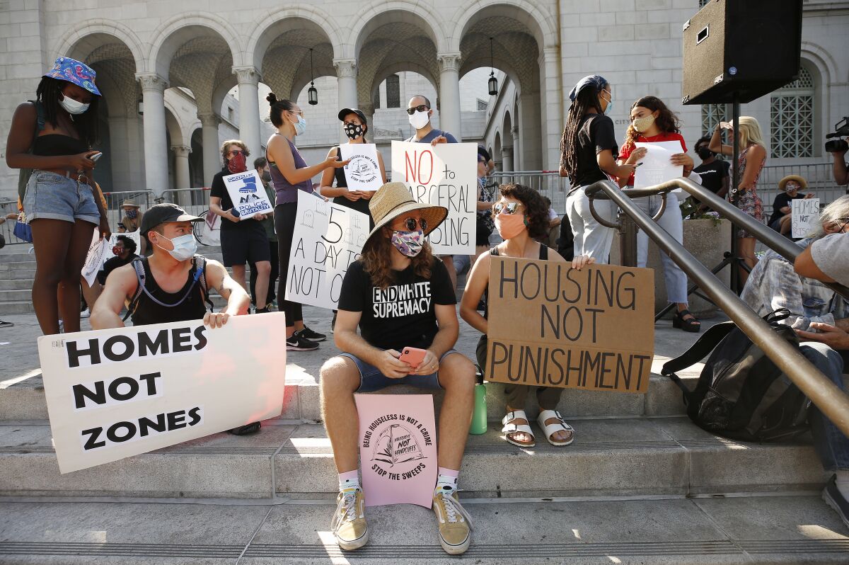 Homeless advocates gathered at city hall for The Right to REST without ARREST rally on the steps of Los Angeles City Hall.