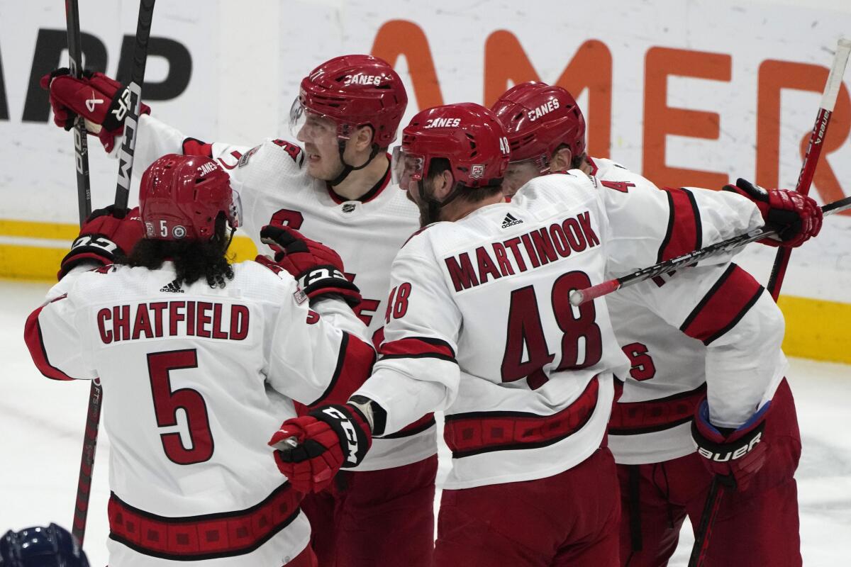 Hurricanes win division with 6-4 win over Panthers