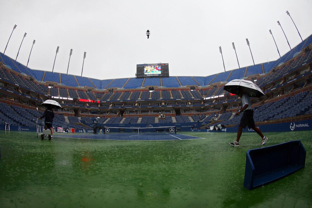 Rain interrupts play during Day 1 of the U.S. Open.