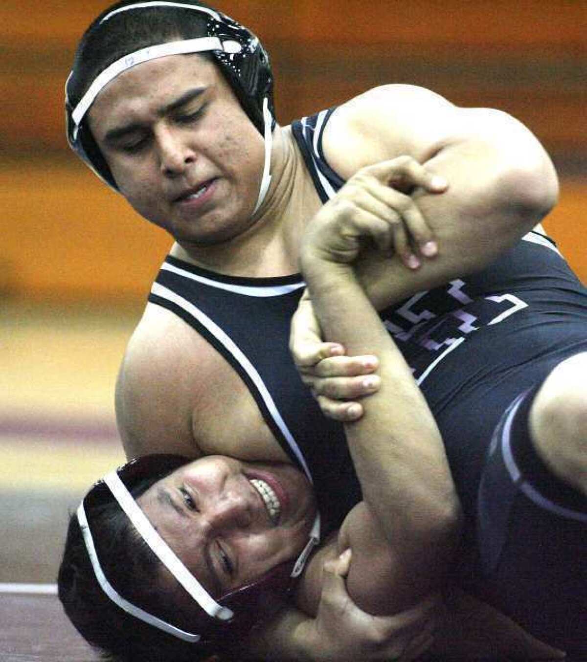 ARCHIVE PHOTO: Senior 220-pounder Gio Martinez has won his last four matches, all by pinfalls, and it's led him to a Rio Hondo League individual title in the second year of Hoover's wrestling program.