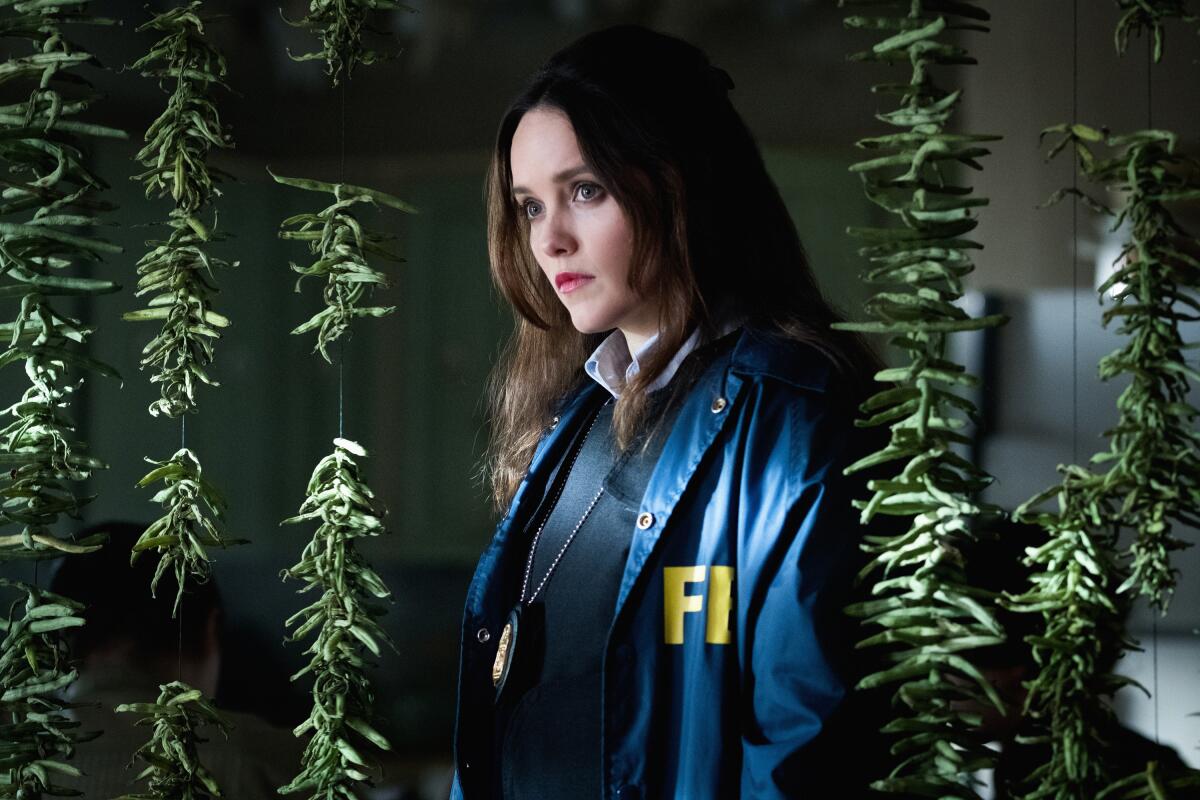 Rebecca Breeds wears an FBI jacket in "Clarice."