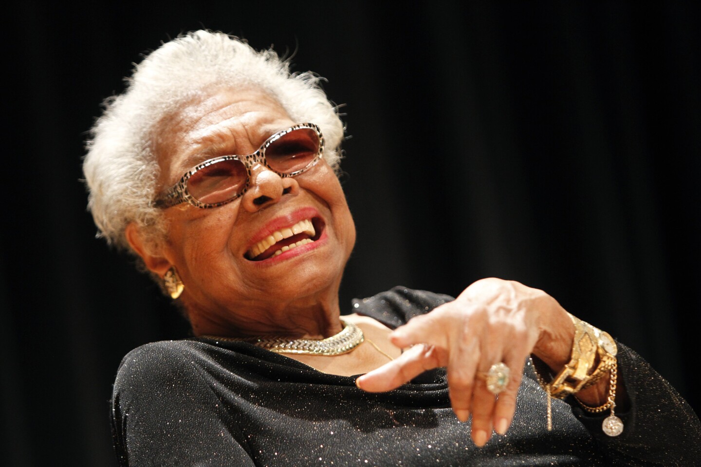 Maya Angelou answers questions at her portrait unveiling in April at the Smithsonian Institution's National Portrait Gallery in Washington.