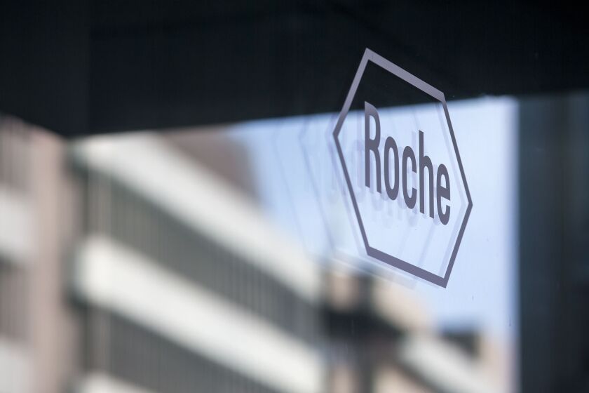 FILE - The logo of the pharmaceutical company Roche is pictured during an annual news conference in Basel, Switzerland, Feb. 1, 2017. A lawsuit against Roche Laboratories Inc., the maker of an anti-malarial drug blamed for causing psychotic and neurological damage in U.S. service members, has been thrown out. U.S. District Court Judge Trina Thompson ruled late Monday, Nov. 28, 2022, that the lawsuit doesn't belong in a California court. (Alexandra Wey/Keystone via AP, File)