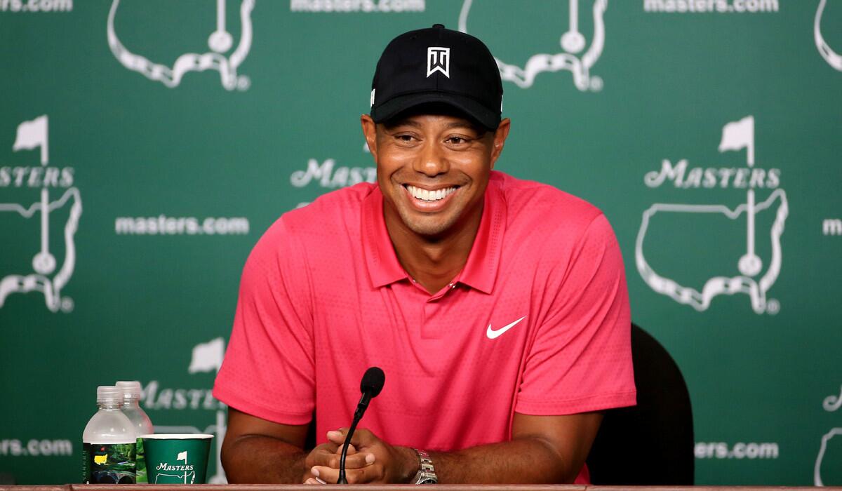 Tiger Woods speaks to the media during a practice round prior to the start of the 2015 Masters Tournament at Augusta National Golf Club on Tuesday.