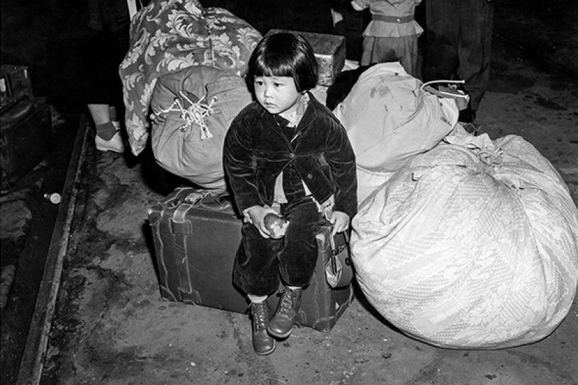 Two-year-old Yukiko Okinaga Hayakawa waited at Los Angeles' Union Station, not far from her home in Little Tokyo, for a train that would take her and her mother to Manzanar War Relocation Center.