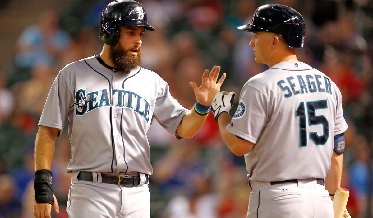 Infielder-outfielder Dustin Ackley, left, and infielder Kyle Seager, former teammates at North Carolina who were selected in the first and third rounds of the 2009 draft, help form the nucleus of the Seattle Mariners, a team built on pitching and defense.