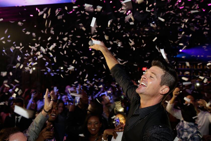 Robin Thicke performs during a New Year's Eve celebration at Foxtail nightclub at SLS Las Vegas.