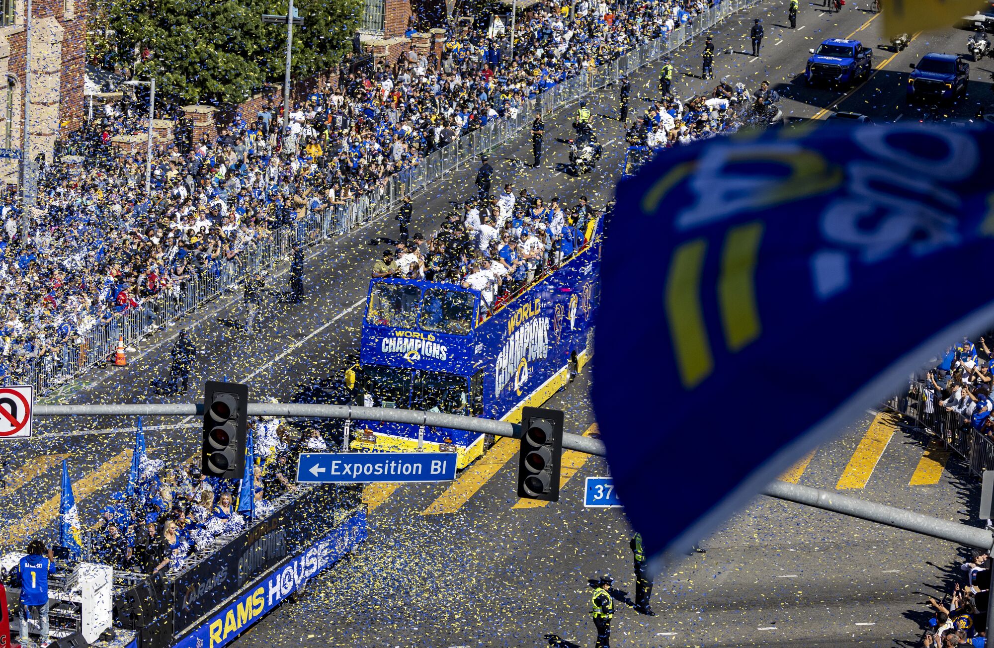 Fans cheer during the Rams Super parade to Exposition Park in Los Angeles.