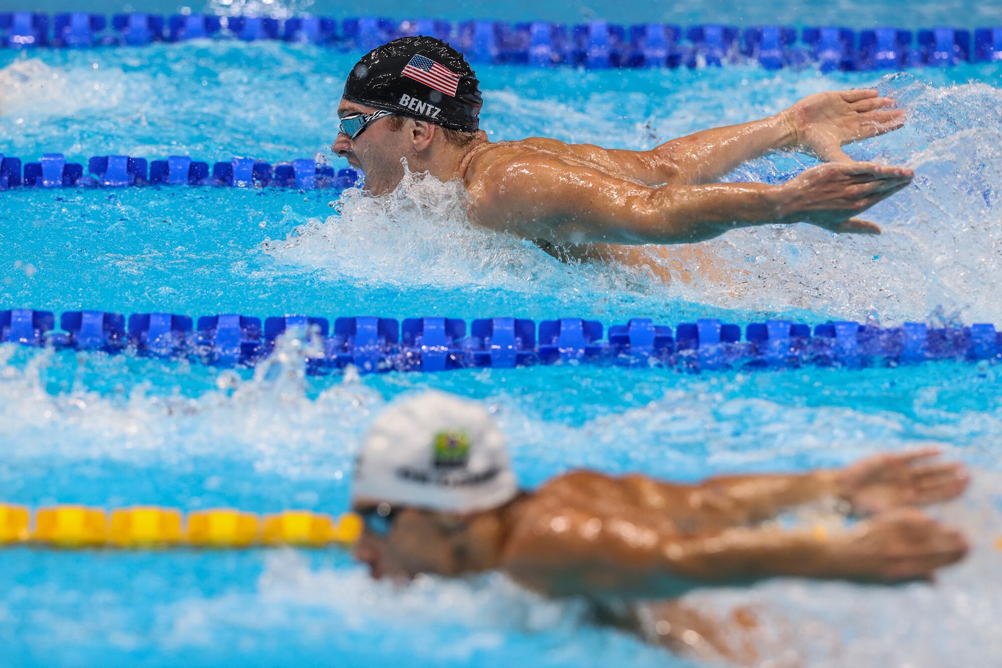 U.S. swimmer Gunnar Bentz, top, competes in the men's 200-meter butterfly final.
