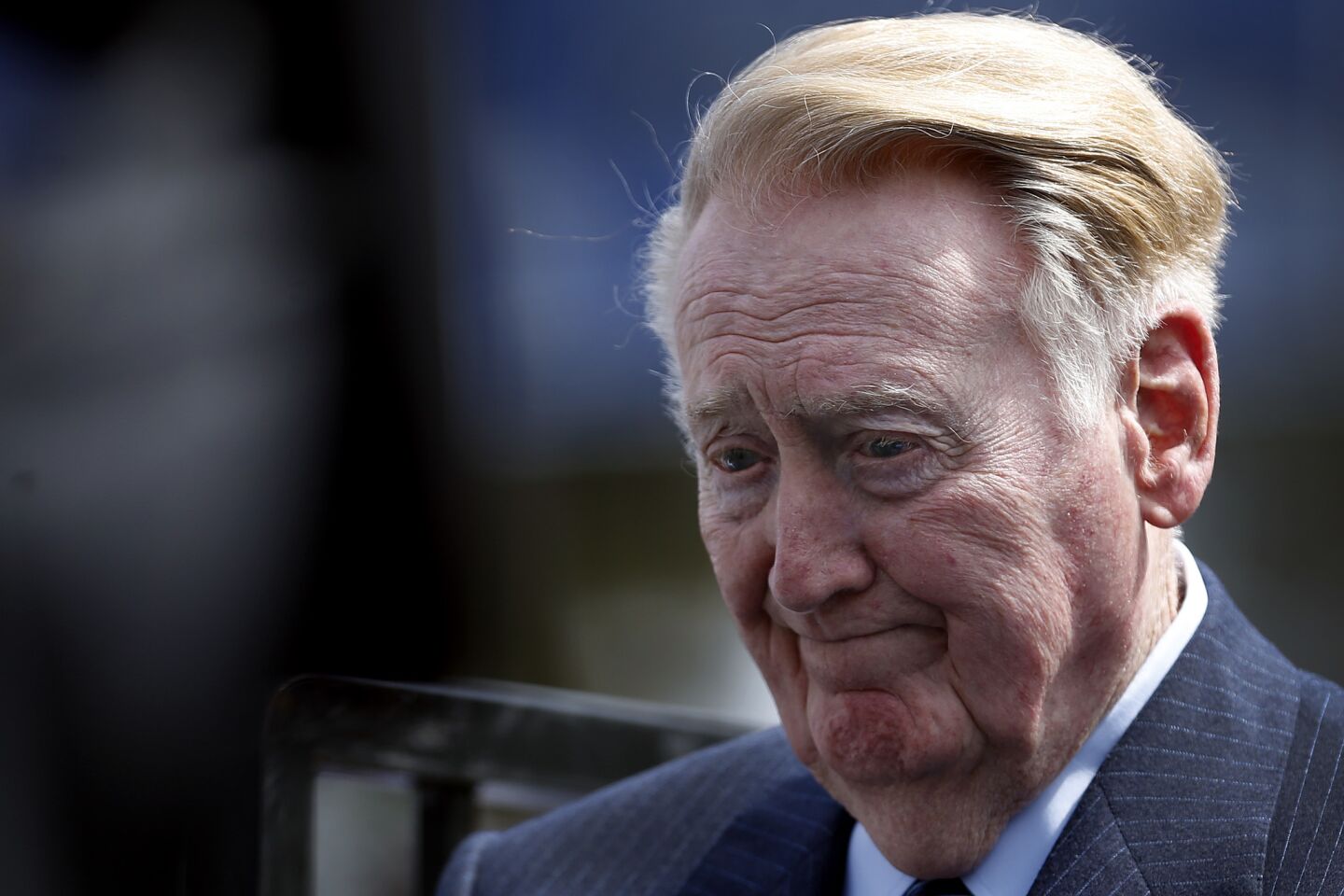 Vin Scully holds back emotions during one of the speeches honoring him during a ceremony on Monday morning.