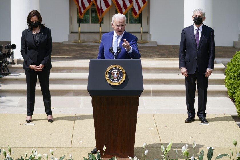 From left, Vice President Kamala Harris, President Biden and U.S. Atty. Gen. Merrick Garland
