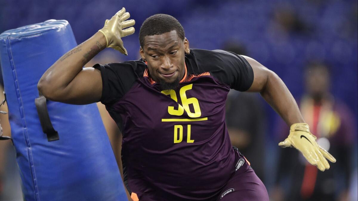 Clemson defensive lineman Clelin Ferrell runs a drill at the NFL scouting combine.