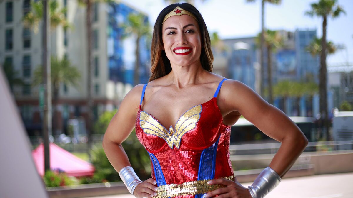 Yvette Vasquez, a San Diego Police officer, dressed as Wonder Woman at Comic-Con in San Diego on July 19, 2018. (Photo by K.C. Alfred/San Diego Union-Tribune)