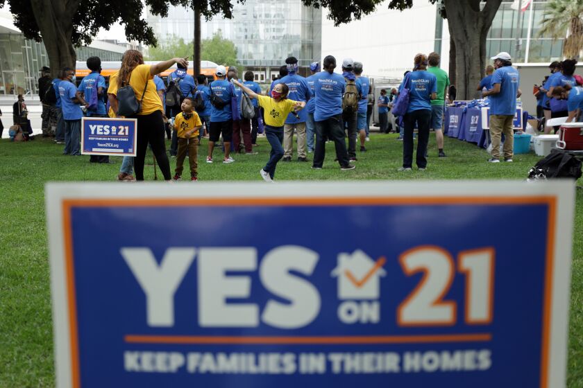 LOS ANGELES, CA - SEPTEMBER 08: A "Celebrate Renters Rally" in support of Proposition 21, a statewide rent control ballot measure, was held at City Hall on Tuesday, Sept. 8, 2020 in Los Angeles, CA. The event drew about 80 people. (Myung J. Chun / Los Angeles Times)