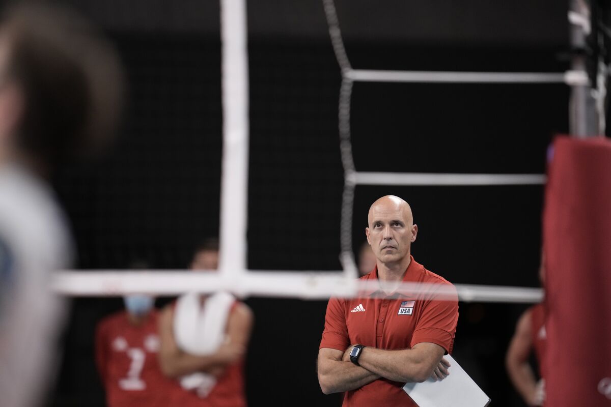 United States' head coach John Speraw stands on courtside during a men's volleyball preliminary round pool B match between the United States and Argentina, at the 2020 Summer Olympics, early Monday, Aug. 2, 2021, in Tokyo, Japan. (AP Photo/Manu Fernandez)
