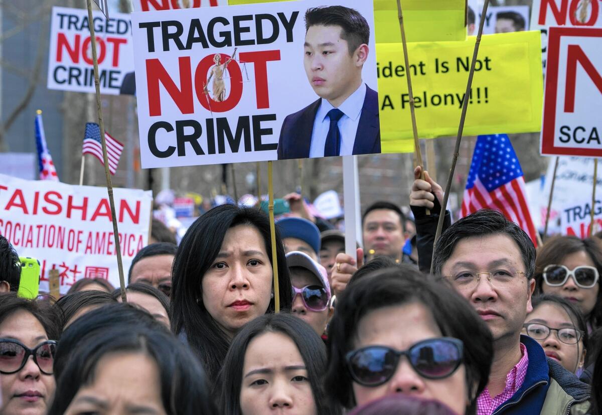 People protest in Brooklyn on Feb. 20 against the conviction of NYPD Officer Peter Liang in the shooting death of Akai Gurley.