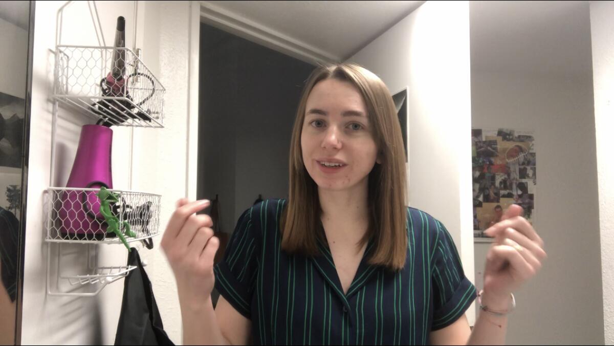 PACIFIC staff writer Sara Butler before she cuts her own hair.