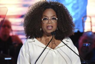 FILE - In this May 15, 2019 file photo, Oprah Winfrey speaks at the Statue of Liberty Museum opening celebration at Battery Park in New York. Winfrey announced Wednesday, Sept. 4, 2019, that she will embark on a nine city arena tour called “Oprah’s 2020 Vision: Your Life in Focus,” that will focus on maintaining a healthy lifestyle. The tour will begin Jan. 4, 2020 in Fort Lauderdale, Fla., and end in early March in Denver. (Photo by Evan Agostini/Invision/AP, File)