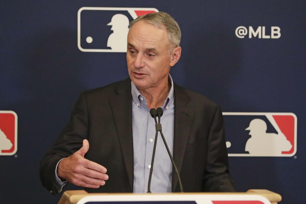 MLB Commissioner Rob Manfred answers questions at a press conference on Feb. 6, 2020 in Orlando, Fla.