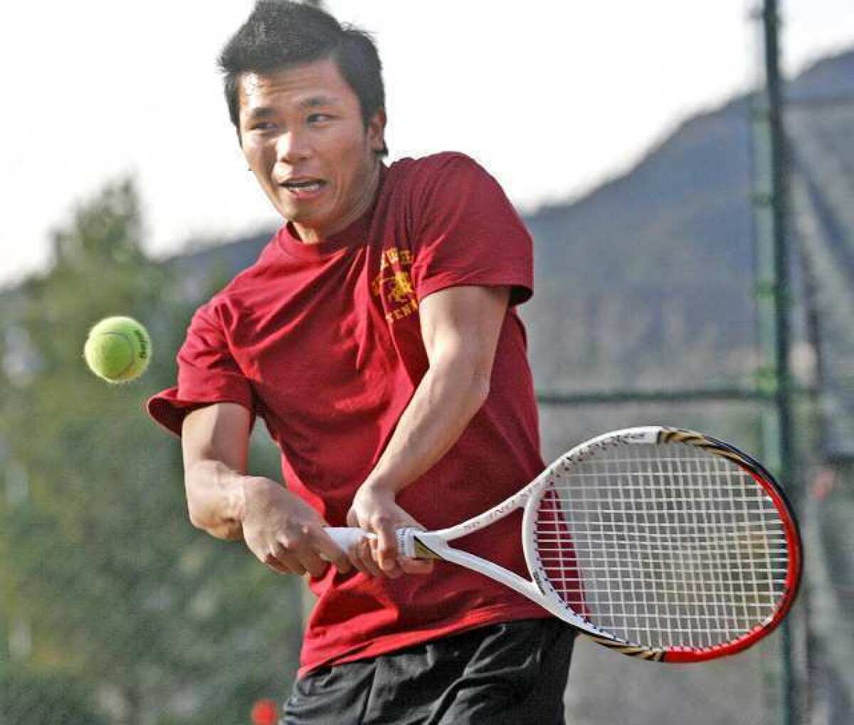 Dat Le, 20, of the Glendale Community College men's tennis team, is a native of Vietnam.