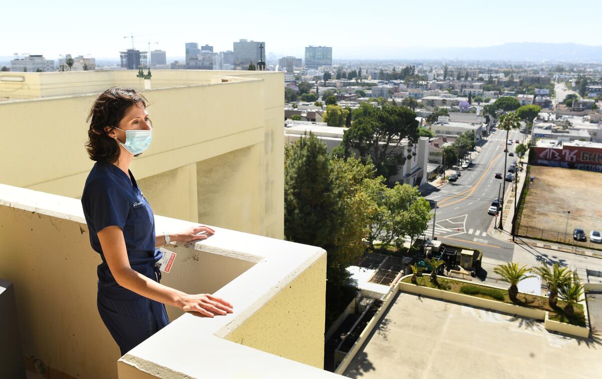 Dr. Jamie Taylor stands in the resting area for doctors who treated COVID patients at Los Angeles Surge Hospital.