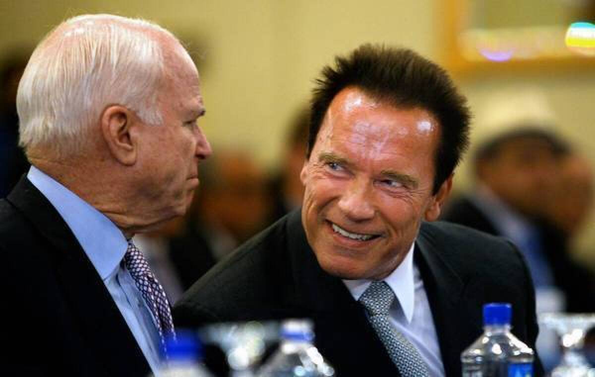 Arizona Sen. John McCain, left, and Arnold Schwarzenegger both spoke at the immigration forum at the USC Schwarzenegger Institute for State and Global Policy.