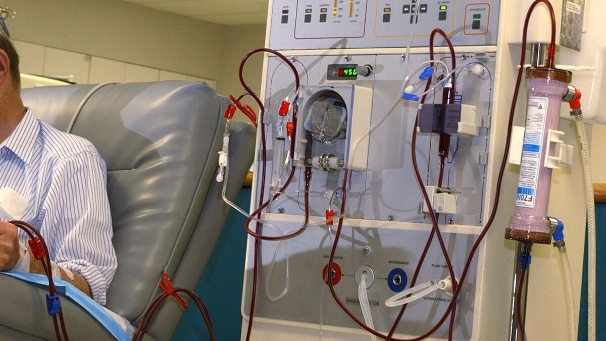 A patient sits during a dialysis session in West Virginia in 2001.