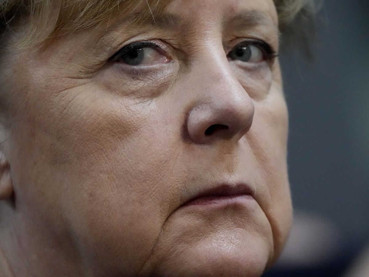 FILE - German Chancellor Angela Merkel looks on during the first plenary session of the German parliament Bundestag after the elections, Berlin, Oct. 26, 2021. Germany's highest court has backed the far-right party Alternative for Germany, AFD, complaint against comments by then-Chancellor Angela Merkel in 2020 that the election of a state governor with the party's support was 'nexcusable' and must not be allowed to stand. Photo/Markus Schreiber, File)