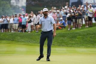 Cameron Young celebrates after making a shot on the 18th green during the third round of the Travelers Championship golf tournament at TPC River Highlands, Saturday, June 22, 2024, in Cromwell, Conn. (AP Photo/Seth Wenig)