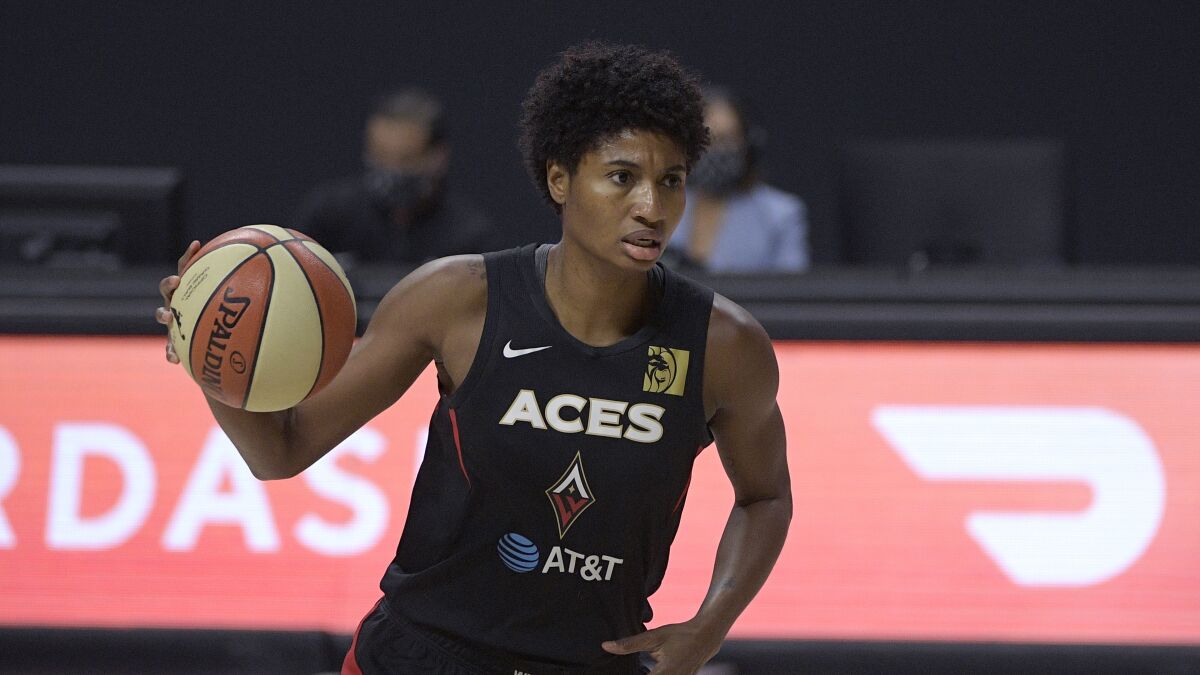 FILE - Las Vegas Aces forward Angel McCoughtry (35) sets up a play during the first half of Game 2 of basketball's WNBA Finals against the Seattle Storm, Sunday, Oct. 4, 2020, in Bradenton, Fla. Angel McCoughtry is heading to Minnesota and Briann January is going to Seattle for her final season in the WNBA. McCoughtry spent the last two seasons in Las Vegas after playing in Atlanta since the Dream drafted her first in 2009. (AP Photo/Phelan M. Ebenhack, File)