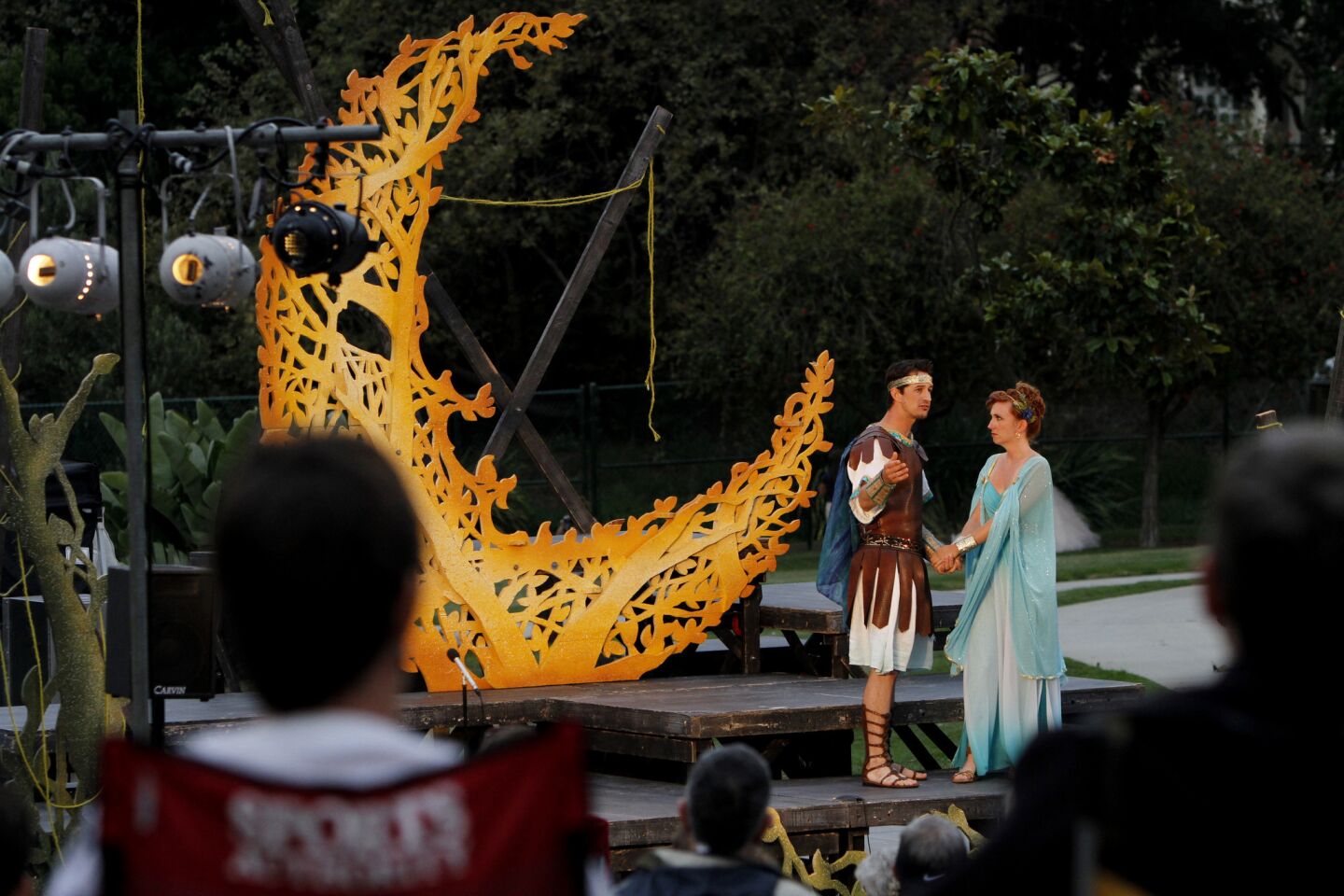 Robert McHalffey (Lysander) and Olivia Schlueter-Corey (Hermia) in a production of "A Midsummer Night's Dream" by Shakespeare by the Sea at Polliwog Park in Manhattan Beach.