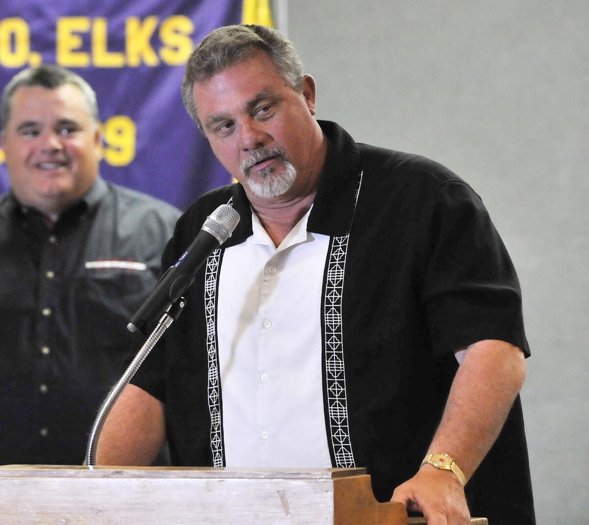 Glendale College's head football coach John Rome speaks about last week's bye and his preparations for next week's football game with the Glendale YMCA Quarterbacks Club at the Elks Lodge in Glendale on Tuesday, Oct. 15, 2013.